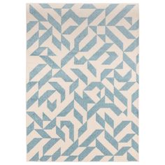 a blue and white rug with an abstract design