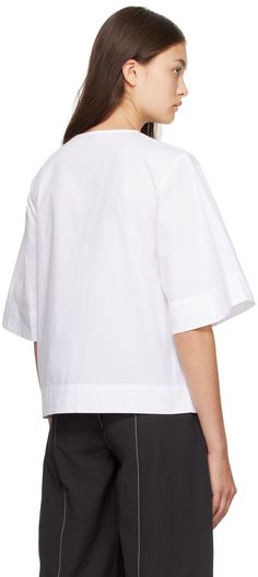 Organic cotton poplin blouse. · Crewneck · Keyhole cutouts at four-button closure · Darts at chest Supplier color: Bright white Chic Poplin Tops For Workwear, Modern Poplin Tops For Spring, Chic Daywear Poplin Top, Chic Poplin Top For Daywear, Modern Poplin Blouse For Work, White Poplin Tops For Daywear, White Button-up Poplin Blouse, Poplin Short Sleeve Workwear Blouse, Short Sleeve Poplin Blouse For Work