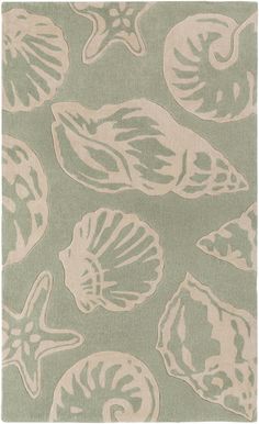 an area rug with shells and starfishs on the side, in light green