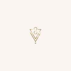 the logo for a jewelry store with an image of a triangle and a ball on it