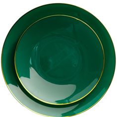 two green plates with gold rims on white background