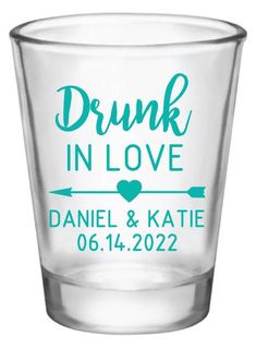 a shot glass with the words drunk in love on it