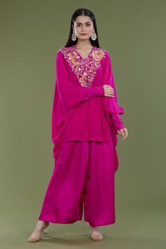 Rani pink high low kaftan with french knots, thread embroidery in floral pattern on neckline. Paired with pant. - Aza Fashions Festive Pink Kaftan For Reception, Traditional Pink Kaftan With Traditional Drape, Pink Kaftan With Dabka Work For Wedding, Pink Bollywood Style Kaftan For Designer Wear, Bollywood Style Pink Kaftan For Designer Wear, Spring Pink Palazzo Set Traditional Drape, Pink Embroidered Kaftan For Wedding, Eid Sets With Embroidered Neckline And Traditional Drape, Festive Pink Kurta With Embroidered Neckline