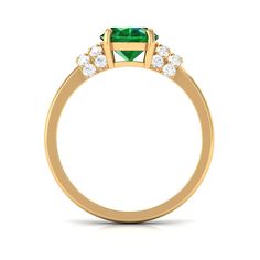 Product Details Make a lasting impression and enhance your personal style with this stunning Solitaire Ring. Crafted with utmost precision, this ring showcases a mesmerizing Oval Cut Created Emerald delicately placed on its distinctive band, secured by elegant prongs. To amplify its allure, a ring of dazzling Round Brilliant Diamond stones encircles the centerpiece, exuding an air of luxury and making it an indispensable addition to your cherished jewelry collection. Product Information SKU SHP-RINGS052310678 Width 4.7 mm Height 9 mm Weight 2.56 gm (Approximate) LAB CREATED EMERALD INFORMATION No.of Stones 1 Pieces Total Weight 3.00 Carat (Approximate) Dimension(approx) Oval-8X10 mm-1 Pcs Color Green Cut Brilliant Shape Oval Setting Type Prong-Setting Quality Grade AAAA DIAMOND INFORMATION Diamond Collar, Oval Setting, Lab Created Emerald, Ring With Diamond, Emerald Engagement, 18k Yellow Gold Ring, Emerald Engagement Ring, Brilliant Diamond, Diamond Stone