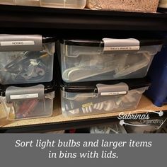 some plastic bins with various items in them on a shelf next to other containers