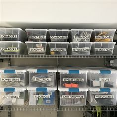 organized storage bins with labels on them