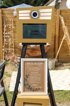 an outdoor photo booth is set up in the yard