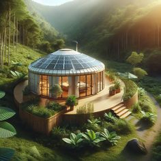 a round house in the middle of a lush green forest