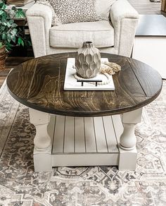 a living room with a couch, chair and coffee table