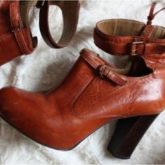 Beautiful Nwot Schuler & Sons Anthropologie Ankle Wooden Booties Schuler & Sons Durable Leather, Classic Hardware And Timeless Silhouettes. Anthropologie Schuler & Sons Tan Leather Booties. Beautiful Caramel Tan Color With Side Zipper. Leather Booties, 3.5" Heel With 1" Built In Platform In Front Bed Of Shoe. Zipper Detail, Two Decorative Buckles. Cognac Brown Color By Shuler & Sons Size 9 1/2 Fits True To Size Side Zip Leather And Synthetic Upper Leather Insole Synthetic Sole 3 1/2" Stacked Woo Chic Ankle Strap Heeled Boots With Stacked Heel, Ankle Strap Heeled Boots For Workwear In Fall, Chic Ankle Strap Heeled Boots For Fall, Brown Boots With Heel Strap For Fall, Chic Brown Ankle Strap Boots, Fall Ankle Strap Boots With Heel Loop, Chic Brown Heeled Boots With Ankle Strap, Chic Brown Ankle Strap Heeled Boots, Ankle Strap Heels With Heel Loop For Fall