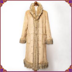 Wear a vintage work of art! Absolutely stunning shaggy faux fur Penny Lane vegan coat. It features a gorgeous floral embroidery &  100% genuine vegan faux fur trim. Size medium/large  ⫸ Beautiful pre-loved vintage condition!  No major flaws. Without any holes, odors. Everything is shown      on the photos. Please see the pictures.  ⫸ 1960s afghan coat style! ⫸ Fabric: shell- polyester/acrylic // 100% genuine vegan faux fur ⫸ Ultra soft and cozy ⫸ ✿ 100% VEGAN ✿ ⫸ Beautiful embroidered details ⫸ Bohemian Outerwear With Faux Fur Lining And Long Sleeves, Bohemian Outerwear With Faux Fur Lining, Bohemian Long Sleeve Fur Coat With Faux Fur Lining, Bohemian Long Sleeve Fur Coat For Fall, Long Hippie Winter Outerwear, Bohemian Long Coat With Faux Fur Trim, Bohemian Long Fur Coat With Faux Fur Trim, Bohemian Faux Fur Coat For Winter, Bohemian Brown Fur Coat With Faux Fur Lining