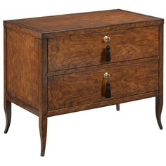 a wooden dresser with two drawers on one side and brass knobs on the other