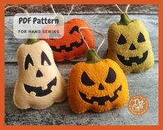 three felt pumpkins with faces on them are hanging from twine strings and the words, free pattern for hand sewing