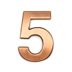 the number five in copper on a white background