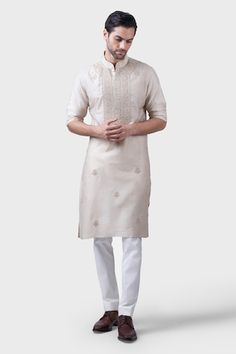 Beige silk kurta with tonal floral embroidery on yoke and sprinkle of buttis in the front. - Aza Fashions Ceremonial Silk Kurta With Chikankari Embroidery, Designer Kurta With Intricate Embroidery For Traditional Ceremonies, Designer Embroidered Kurta For Traditional Ceremonies, Eid Straight Kurta With Tonal Embroidery, Festive Wedding Kurta With Tonal Embroidery, Festive Traditional Wear With Tonal Embroidery For Eid, Eid Festive Traditional Wear With Tonal Embroidery, Traditional Kurta With Tonal Embroidery For Eid, Traditional Festive Kurta With Tonal Embroidery