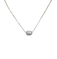 This elegant necklace showcases the timeless beauty of a single pearl delicately dangling from a dainty gold chain. The simplicity of the design highlights the natural allure of the pearl, creating a graceful and sophisticated piece. The necklace measures 16 inches in length, offering a classic and flattering fit around the neckline. Additionally, it can be adjusted to a shorter length of 15 inches, allowing you to wear it as a choker-style necklace for a more intimate and refined look. The sing Minimalist Pearl White Pearl Chain Necklace, Classic White Pearl Drop Chain Necklace, Minimalist Pearl Charm Chain Necklace, Simple Pearl Chain Necklace, Minimalist White Chain Necklace With Pearl Pendant, Everyday Pearl Necklace With Delicate Chain, Classic Pearl Chain Necklace With Pearl Charm, Minimalist Pearl White Chain Necklace With Pearl Drop, Minimalist Pearl White Necklace With Delicate Chain