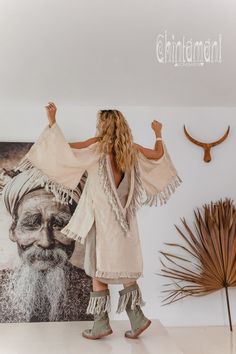 "⫸ We ship by EXPRESS EMS now for fast & safe delivery! Alma Libra Cream Boho Kimono Robe This Fringe Kimono Jacket is a unique mix of boho, American Indian and oriental elements into an alchemical Chintamani masterpiece. Made out of soft pure linen, it comes in raw unbleached silver-grey color or hand dyed delicate tints of pink, cream and strong, wholesome black. From the front it reminds of classic Japanese kimonos with simple square silhouette, but its sleeves have a very original twist Boho Womens Clothing, Boho Robes, Robe Women, Bohemian Scarves, Kimono Wrap Dress, Linen Kimono, Poncho Coat, Cardigan Kimono, Fringe Kimono