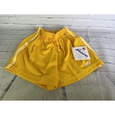 Several Colors And Sizes Are Available In Our Store While Supplies Last! Combined Shipping Is Available! Please Contact Us For More Information! Up For Grabs Is A Brand New Vintage Mizuno Volleyball Shorts Deadstock Yellow Unisex Men's Women's Size Small Made In Usa. Official Brand Of The Team Usa Volleyball Division. Pull On Style! Has An Elastic Waistband Which Stretches To Measurements Shown In Photos! Never Worn Or Used. This Is Vintage And Specific To Volleyball Standards For The Times So T Vintage Athletic Shorts, Yellow Athletic Shorts With Elastic Waistband For Sports, Retro Athletic Shorts For Sports, Mizuno Volleyball, Usa Volleyball, Volleyball Shorts, Team Usa, Make Color, Shorts Athletic