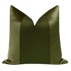 a green pillow with an arch design on the front and back, along with a white background