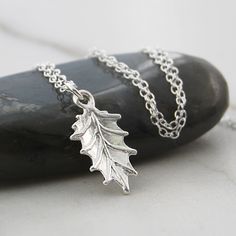 This delicate Holly Leaf Sterling Silver Christmas Necklace makes for an adorable Christmas Necklace. Perfect for that party or for when you want something pretty, elegant and understated on Christmas Day, and a great Christmas jewellery gift for those who truly embrace the festive spirit. This Christmas Necklace is also available in yellow and rose gold. Made from: Sterling silver. Measurements: Pendant Drop Length: approx. 1.8cm Our standard chain length is 16'' plus 2'' extension (which makes the total length 18''). Leaf Necklace Silver, Christmas Styling, Christmas Jewellery, Rose Gold Christmas, Holly Christmas, Christmas Necklace, Drop Pendant Necklace, Earrings And Necklace, Silver Christmas