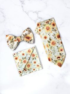 Our wild sunflower floral ties, bow ties, & pocket squares- PERFECT for bowties for bohemian wedding accessories, bowtie with sunflowers and pocket square for men, mens ties or a mens gift!//SHIPPING// We ship via USPS. **FIRST CLASS MAIL (default) takes 2-5 business days to arrive AFTER your package is shipped. **PRIORITY MAIL takes 1-3 business days to arrive AFTER the items are shipped.//Important// Business Days are Monday-Friday//International Orders// Please understand that International O Summer Pocket Square For Suit And Tie As Gift, Summer Gift Pocket Square For Suit And Tie, Summer Gift Pocket Square Suit Accessories, Floral Print Suit And Tie Accessories For Summer Weddings, Summer Wedding Ties For Groom, Summer Wedding Suit And Tie Accessories With Floral Print, Summer Bow Tie For Groom, Summer Bow Ties As Gifts, Dapper Suit And Tie Accessories For Summer Weddings