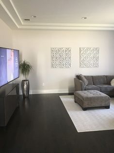 the living room is clean and ready to be used as a home theater or entertainment center