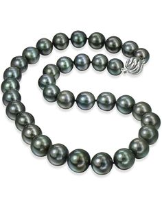 Tahitian Pearl Necklace with a 14 karat white gold spiral ball clasp. 35 pearls each between 11-14.4mm. 18″ long. Classic Tahitian Pearl Necklace With Round Beads, Classic Tahitian Pearl Round Bead Necklaces, Classic Tahitian Pearl Round Bead Necklace, Luxury Single Strand Tahitian Pearl Necklace, Elegant Single Strand Tahitian Pearl Necklace, Luxury Tahitian Pearl Single Strand Necklace, Classic Tahitian Pearl Beaded Necklace, Formal Single Strand Tahitian Pearl Necklace, Tahitian Pearl Necklace With Single Strand Of Round Beads