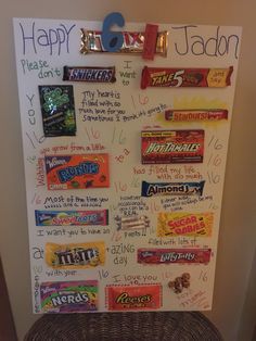 a bulletin board with candy bars on it