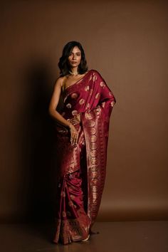 This handwoven wine red Banarasi saree, crafted from luxurious Mashru satin silk, features intricate Minakari work. Perfect for special occasions, this saree is designed to elevate your style. Designer Red Paithani Silk Pre-draped Saree, Red Pre-draped Saree With Zari Weaving In Jamawar, Red Banarasi Silk Pre-draped Saree, Red Jamawar Pre-draped Saree With Traditional Drape, Red Jamawar Pre-draped Saree In Traditional Drape, Red Jamawar Pre-draped Saree In Traditional Style, Traditional Red Jamawar Pre-draped Saree, Formal Katan Silk Pre-draped Saree, Red Meenakari Jamawar Saree