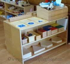 a child's workbench with lots of toys on it