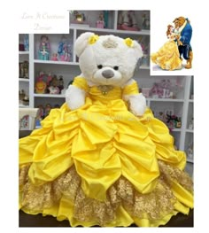 a white teddy bear wearing a yellow dress