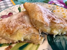 two pieces of pie on a plate with flowers