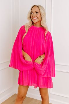 - You will be a captivating beauty in this trendy dress! - Fully lined, pleated chiffon material in a pink hue - Sleeveless cut with a flowy draped design - High, round neckline with back button closure - Back keyhole detail - Ultra relaxed silhouette that ends in a rounded hemline Measurements S : Bust 34", Hip 36", Length 30", Sleeve Length 25.5", Slip Length 29", Waist 34". M : Bust 36", Hip 38", Length 30.5", Sleeve Length 26.5", Slip Length 29.5", Waist 36". L : Bust 38", Hip 40", Length 30 Pink Runway, Chiffon Material, Designer Drapes, Women Clothing Boutique, Trendy Dresses, Online Womens Clothing, Round Neckline, Shift Dress, Boutique Clothing