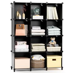 an open shelving unit filled with lots of folded towels and other items on top of it