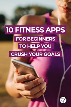 a woman with headphones on looking at her cell phone and texting 10 fitness apps for beginners to help you crush your goals