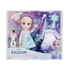 the frozen princess doll is in its box with two other dolls and one has a snowman