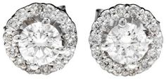 Exquisite .80 Carats Natural Diamond 14K Solid White Gold Stud Earrings Amazing looking piece! Suggested Replacement Value Approx. $3,500.00 Total Natural Round Cut Diamonds Weight: Approx. .80 Carats (both earrings) SI1 / H Diameter of the Earring is: Approx. 6.60mm Center Diamond Size is: Approx. 4.00mm Center Diamond Weight is: Approx. 0.25 carat (each) Total Earrings Weight is: 1.4 grams Disclaimer: all weights, measurements and colors are approximate and may vary slightly from the listed di Formal Round Platinum Cluster Earrings, Luxury Round Cut Cluster Earrings For Anniversary, Luxury Cluster Earrings For Anniversary, Luxury Cluster Earrings With Prong Setting For Anniversary, Luxury White Cluster Earrings With Halo Setting, Formal White Halo Cluster Earrings, Luxury Brilliant Cut Cluster Earrings For Anniversary, Luxury White Cluster Earrings With Brilliant Cut, Luxury Halo Diamond Earrings For Anniversary