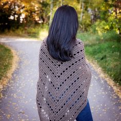 This crochet triangle shawl pattern is easy peasy and creates a gorgeous shawl with the perfect drape to wrap around your neck, doubling as a scarf. Materials: To make this shawl, you will need the following supplies: 7 Skeins (Approx. 700 yards) Hobbii Amigo XL Worsted Weight Yarn in Walnut (A05). Size I-9 (5.5 mm) crochet hook. Scissors. Tapestry/yarn needle (for weaving in ends). Measurements: Finished shawl measures 67" wide X 38" long after blocking. Skill Level: ﻿Beginner. Triangle Shawl Crochet, Triangle Shawl Pattern, Crochet Caplet, Shawl Scarf Crochet, Shawl Scarf Pattern, Crochet Triangle Shawl, Crochet Triangle Shawl Pattern, Triangle Shawl, Shawl Crochet