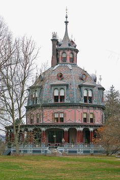 an old house with a large tower and many windows