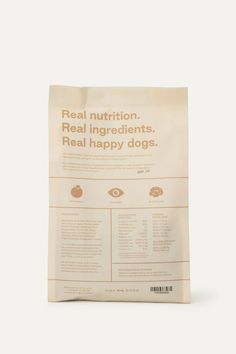 a bag of real ingredients for dogs on a white background with the text real nutrition, real ingredients real happy dogs