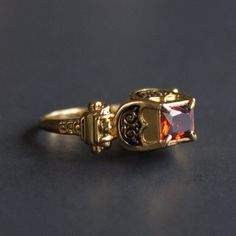 Massive Renaissance ring with enamel. This ring shape was pretty popular in 16th century Western Europe. Brass or silver cast, gold plating, cold enamel, CZ garnet. Available stone colors: red, purple, green, blue, light blue, black, transparent (diamond). Please point out the desirable stone color in the notes to your order. Weight 11 g. Please note that this ring is quite massive and we cannot make it less than 7 3/4US / 18DE size. Medieval Ring, Medieval Accessories, Enamel Rings, Cold Enamel, Medieval Rings, Ring Shapes, Western Europe, Enamel Ring, 16th Century