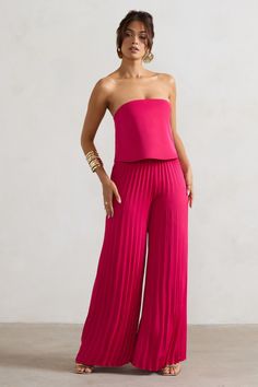 Add Tammi, our strapless staple jumpsuit to your evening repertoire this event season. Arriving in a dark pink shade of our premium satin, Tammi boasts a bandeau neckline with a draped bodice overlay. Elevated by elegant plisse legs, this jumpsuit is perfect for your next ladies day.Features - Premium satin- Bandeau neckline - Strapless- Bodice overlay- Invisible zip closure - Plisse wide-legSizing & Fit Model is 5'8" and wears UK size 8 / US size 4Product Information Designed exclusively by Club L London Fully lined with no stretch Premium satin in Dark Pink (100% Polyester) 84cm total leg length SKU: CL134685204 Draped Bodice, Club L London, Black Dress Prom, Black Tie Gala, Pink Shade, Party Dress Long Sleeve, Bridesmaid Outfit, Christmas Party Dress, Black Sequin Dress