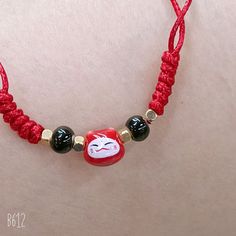 Material: Red Rope Fashion Element: Lucky Cat Style: Natural Handmade Red Casual Friendship Bracelets, Casual Red Handmade Friendship Bracelets, Casual Red Round Beads Friendship Bracelets, Casual Red Round Beads Friendship Bracelet, Casual Red Friendship Bracelets With Round Beads, Casual Red Beaded Friendship Bracelets, Rope Anklet, Red Rope, Rope Weave