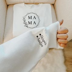 "MAMA Sweatshirt with kids names on the sleeve ~ MATERIALS//COLORS I use Gildan 18000 or Fruit of the Loom SF72R Sweatshirts. They are UNISEX crewneck sweatshirts. These shirts go great with a casual wardrobe, jeans or shorts, tights or sweats! If you prefer a certain brand please make a note during check out in the \"Note to Seller\" area. Sweatshirts come in White, Navy, Black, and Athletic Heather (grey). ~ SIZING ~ They fit true to size, order your regular size if you want it fitted, if you Sleeve Names, Nana Sweater, Shorts Tights, Nana Birthday, Mama Sweater, Kids Names, Htv Vinyl, Mama Sweatshirt, Mail Letters