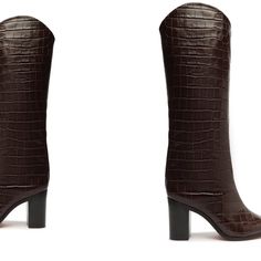 Founded in 1995 by Alexandre Birman, Schutz redefines attainable luxury with its stylish footwear. With each new release, the brand delivers of-the-moment collections, defined by confident, bold, designs around which entire outfits can be built. There are boots and then there is the Maryana Block Boot in Dark Chocolate, crafted in luxurious crocodile-embossed leather and boasting a sturdy block heel. Alluring and sophisticated, we love it both with jeans and your most elegant dresses. Product De Stylish Footwear, Rubber Patch, Trendy Boots, Alexandre Birman, Knee Boot, Mid Heel, High Heel Boots, Embossed Leather, Cow Leather