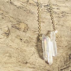 Quartz crystal necklace that is high vibe, unique and stylish Mystical Gold Crystal Necklaces With Gemstone, Mystical Gold Gemstone Crystal Necklaces, Elegant Quartz Crystal Necklace For Healing, Gold Mystical Crystal Necklace For Meditation, Faceted Mineral Crystal Spiritual Necklace, Faceted Crystal Necklaces For Gift, Spiritual Style, Spiritual Clear Quartz Crystal Necklace, Crystal Spikes, Angel Aura Quartz Necklaces