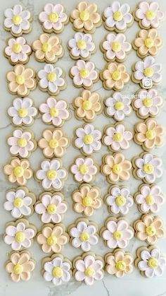 some cookies that are decorated with flowers on them