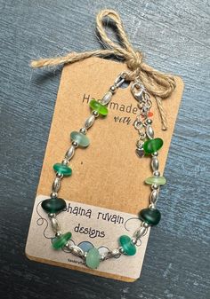 This bracelet is made with genuine sea glass and sterling silver. The sea glass has lovely shades of green. Green Beach, Glass Beads Jewelry, Beach Glass, Sterling Silver Bracelet, Sterling Silber, Shades Of Green, Sea Glass, Sterling Silver Bracelets, Favorite Jewelry