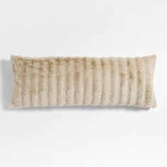 a pillow made out of sheepskin on a white background