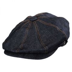 The Jaxon Denim Newsboy is an attractive dark blue denim cap constructed of comfortable, 100% cotton denim fabric. A grosgrain sweatband, satin lining and removable Jaxon side pin finely detail the 8/4 cap; its double snap brim detail helps maintain its shape.  Assert your non-conformist style with the Jaxon Denim Newsboy Cap!  Approx. 2 1/8" Double Snap Bill 9 1/2" Diameter Made of: 100% Cotton Dark Blue Denim Gold Stitching Satin Lining Removable Jaxon "J" Side Pin Grosgrain Ribbon Sweatband S Adjustable Cotton Casual Beret, Casual Cotton Flat Cap Beret, Casual Cotton Beret Flat Cap, Casual Adjustable Visor Beret, Casual Adjustable Beret With Short Brim, Casual Adjustable Brimmed Beret, Casual Blue Beret, Spring Denim Flat Cap, Blue Casual Flat Cap Beret